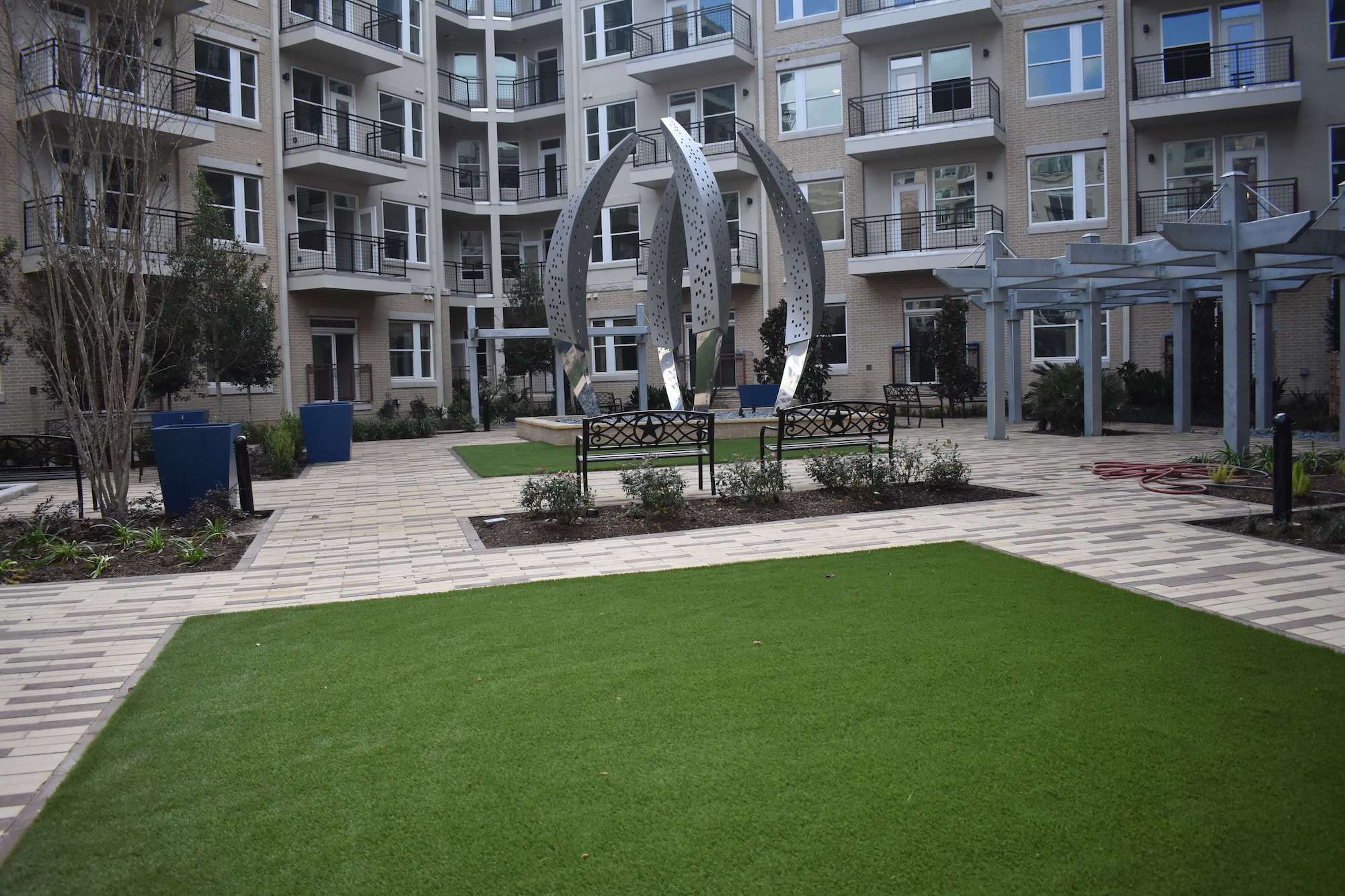 Commercial artificial grass lawn at apartment complex