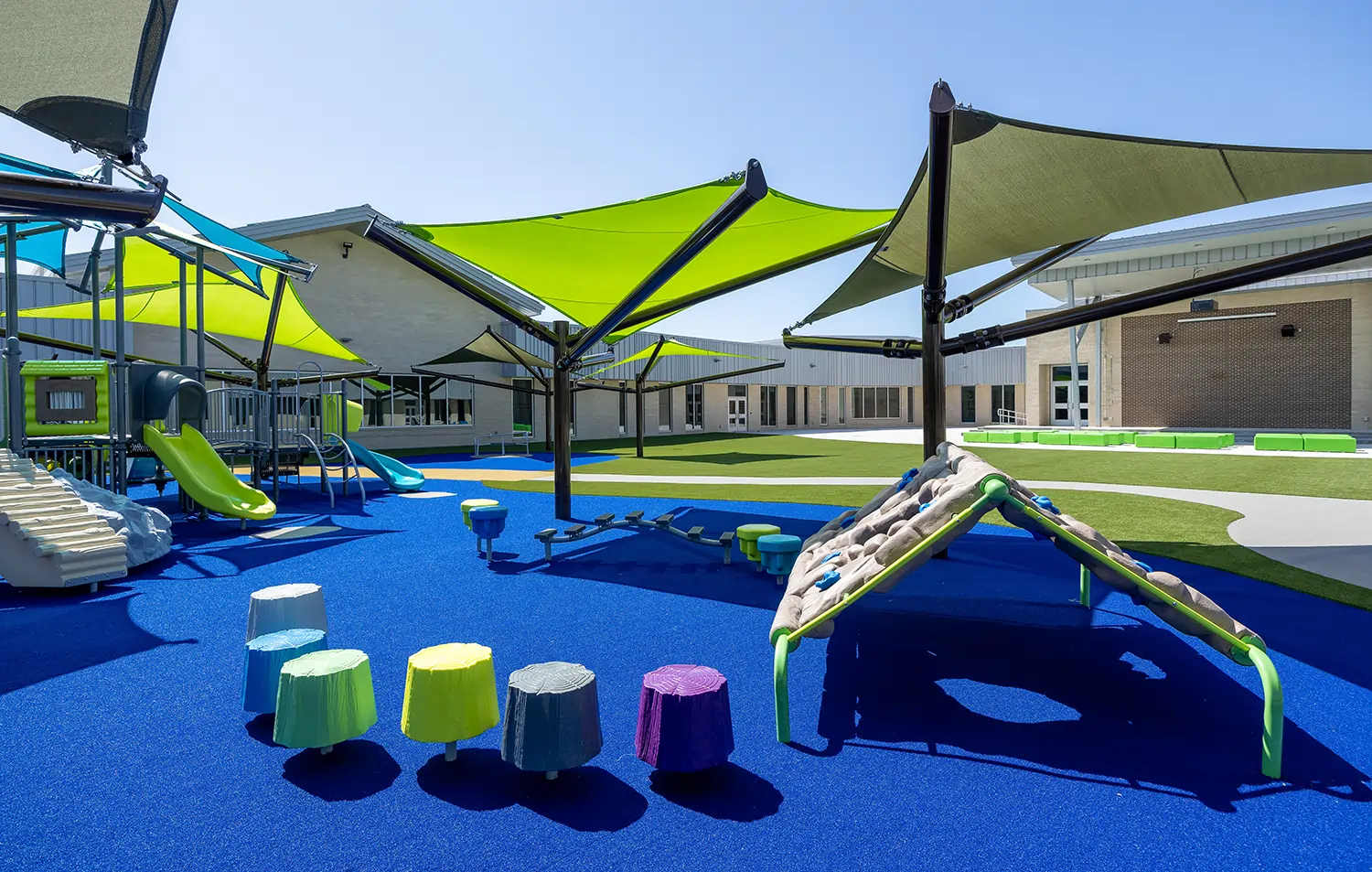 Gregory I S D playground artificial grass installation