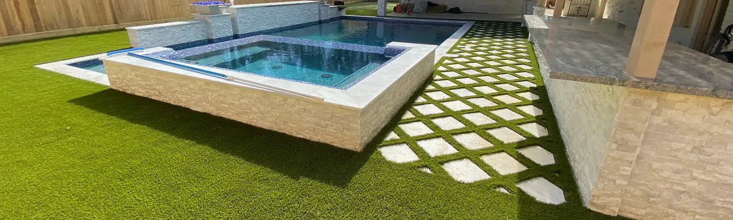 Backyard artificial grass pool area installed by SYNLawn