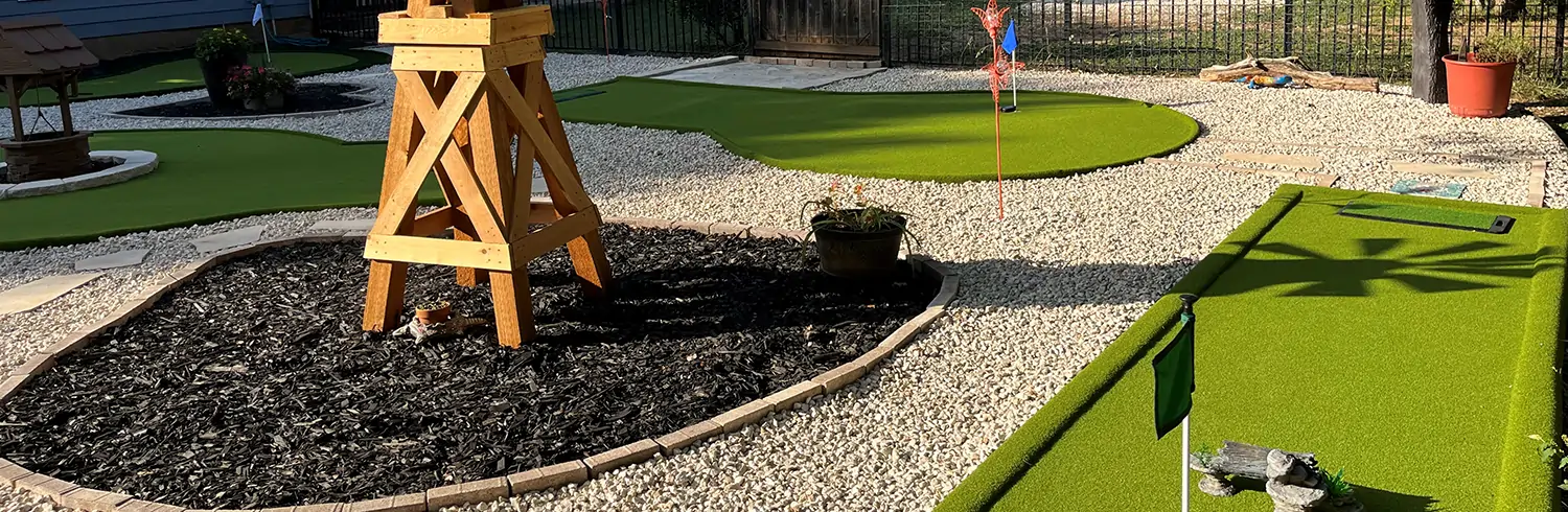 Backyard golf green installed by SYNLawn