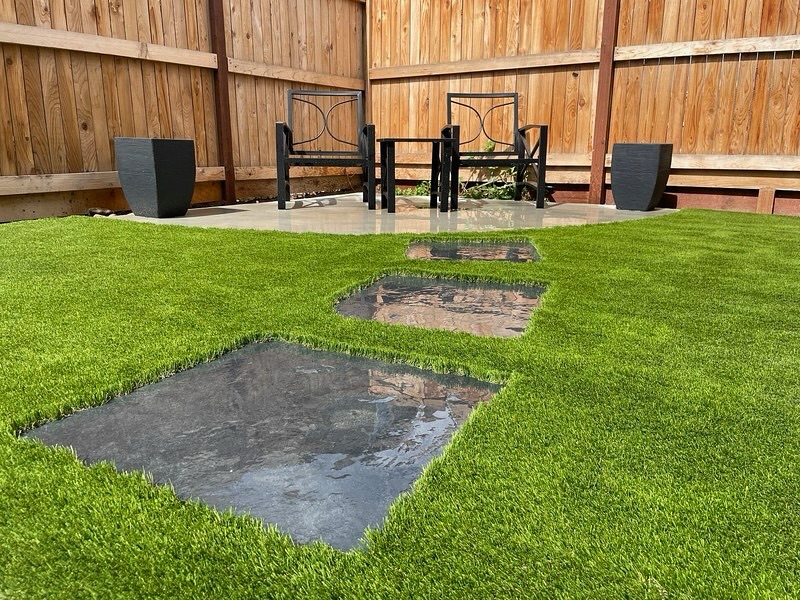 Backyard Patio with San Antonio Artificial Grass and Decorative Stone Stepping Path Backyard Patio with San Antonio Artificial Grass and Decorative Stone Stepping Path